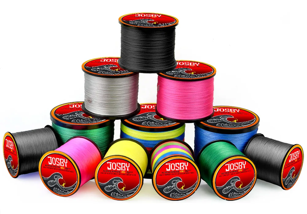Una colección de carretes de hilo de pescar. Cada carrete tiene una etiqueta con la marca JOSBY y presenta un diseño colorido con un motivo ondulado, lo que sugiere que el hilo de pescar está diseñado para su uso en pesca en agua dulce o salada.