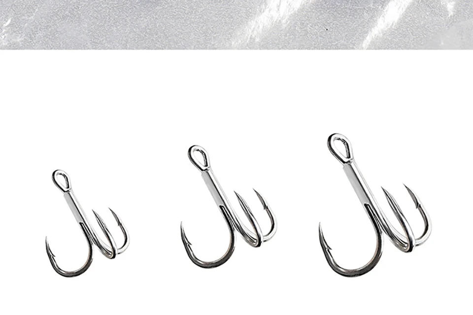 Se muestran una fila de ganchos en un fondo blanco.