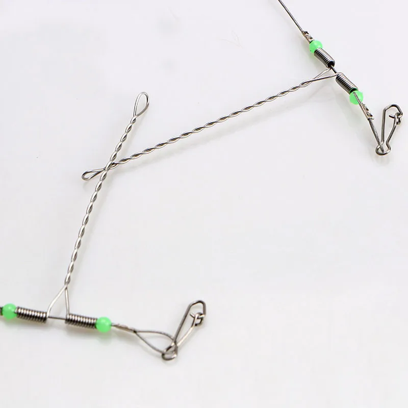 Aparejos de Pesca de mar, juego de línea de Pesca nocturna fluorescente, soporte de equilibrio de alambre de acero, antienredos, 5 uds. - imagen 4