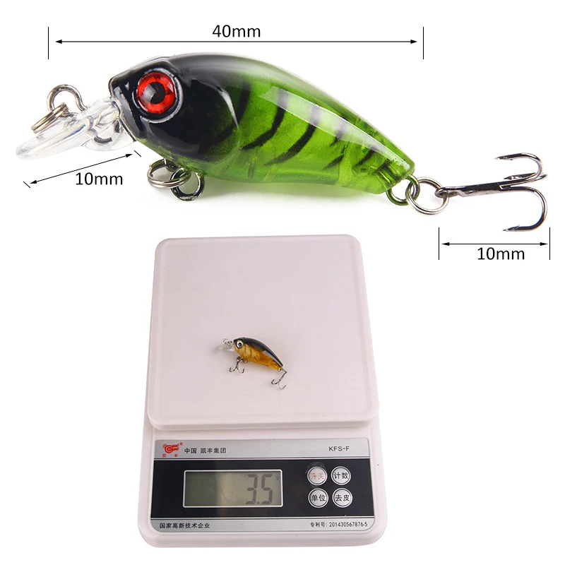 Un pequeño señuelo de pesca con un diseño vibrante verde y negro que mide 10 mm de longitud y pesa 3