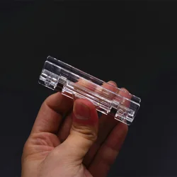 Clip portaplumas CDC profesional para atado de moscas