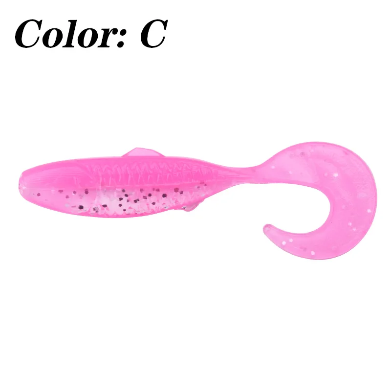 Un señuelo rosa, que es un tipo de cebo de pesca artificial diseñado para parecerse a un pez. Tiene un cuerpo con un patrón de manchas y una cola que probablemente pretende imitar el movimiento de un pez cuando se recupera del agua.