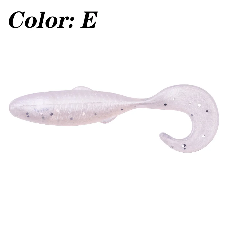 Un señuelo, que es un tipo de cebo de pesca artificial diseñado para atraer peces. Este señuelo en particular es un cebo de plástico blando que se asemeja a un pez, con un cuerpo y una cola que probablemente imitan el movimiento y la apariencia de un pez real.