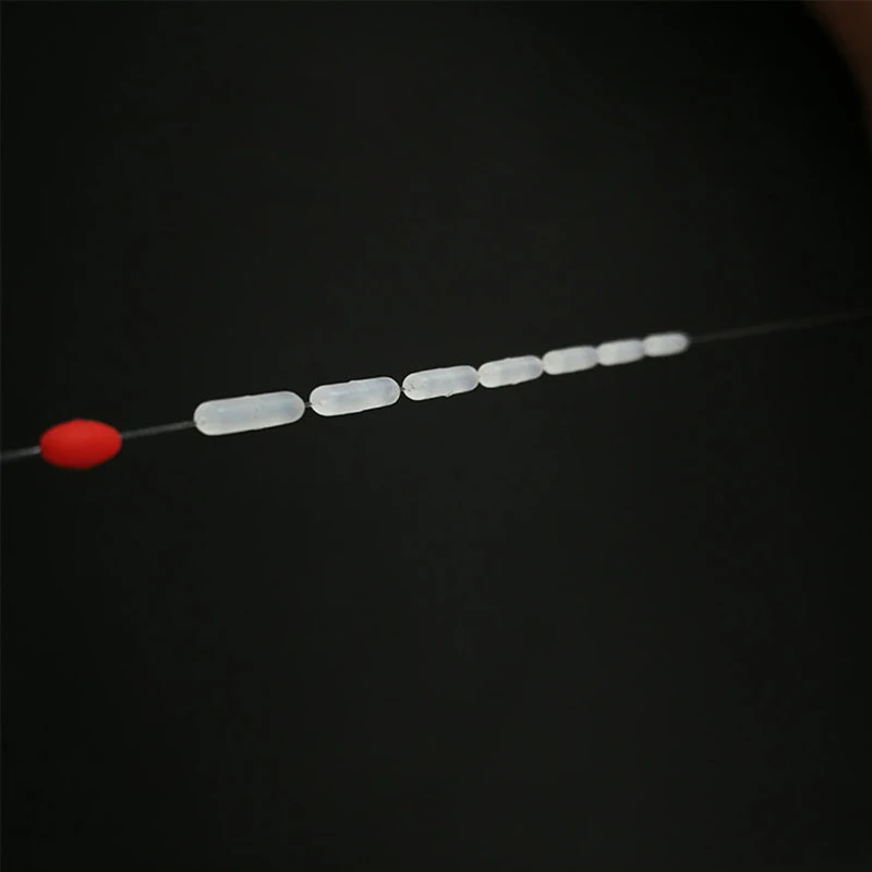 Simpleyi 10 unids/lote corcho de pesca Float 8 en 1 de caucho negro Oval tapón Space Bean conector de línea de pesca abordar Accesorios - imagen 2