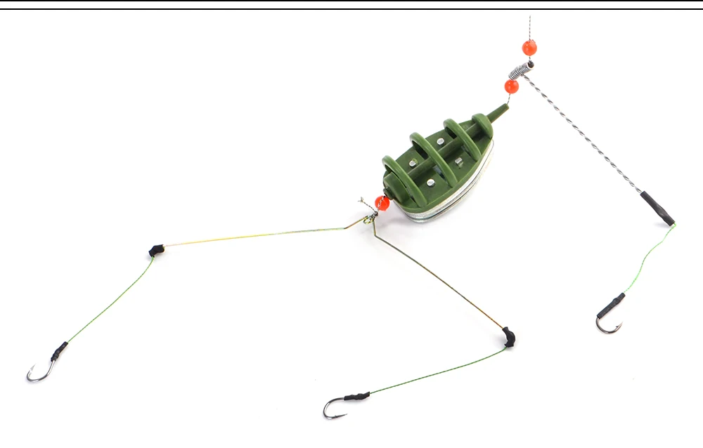 Una configuración de señuelo de pesca con un bobber verde y múltiples ganchos ideales para una pesca efectiva