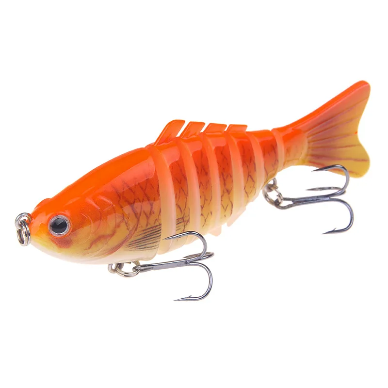 Un vibrante señuelo de pesca naranja con tres ganchos de agudos, diseñados para una pesca efectiva