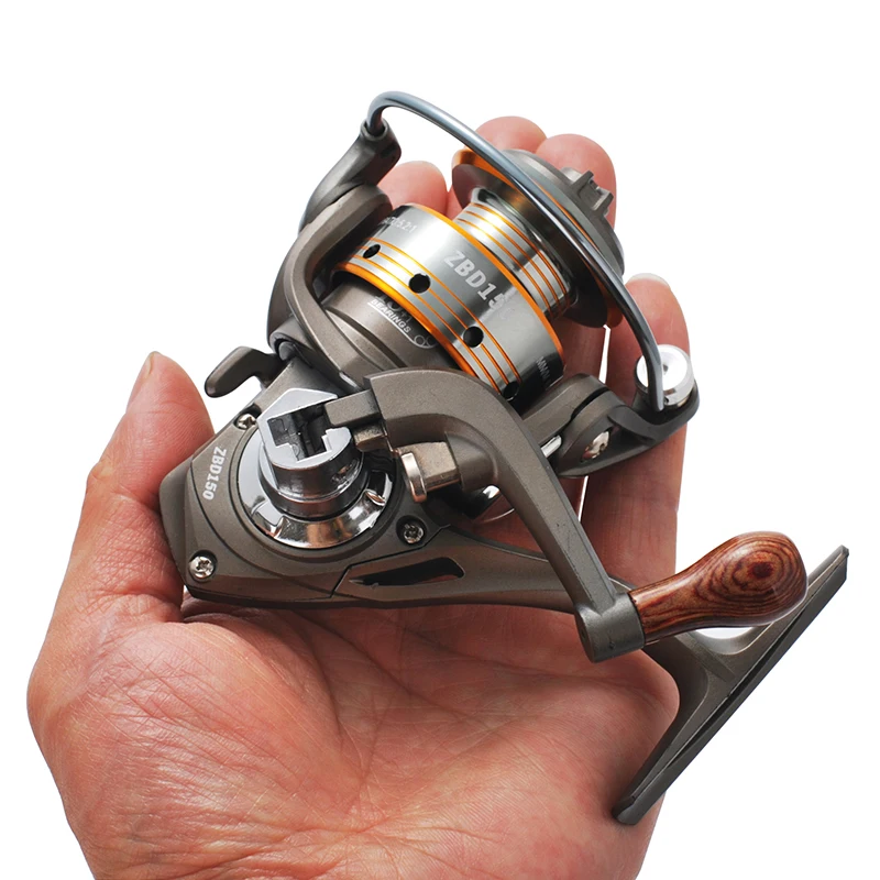 Pesca de lagarto 6 rodamientos Mini en palma relación 5,2: 1 Nylon 66 + Material de fibra de vidrio Mini pesca en hielo, carrete de pesca en roca y señuelo