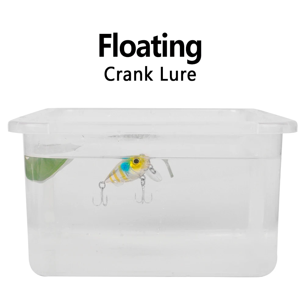 Un señuelo de pesca está flotando en un recipiente de agua