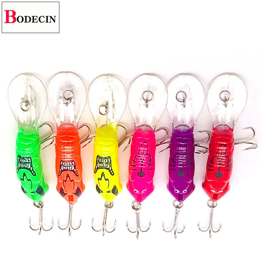 Una fila de coloridos señuelos de pesca con un logotipo de Bodecin