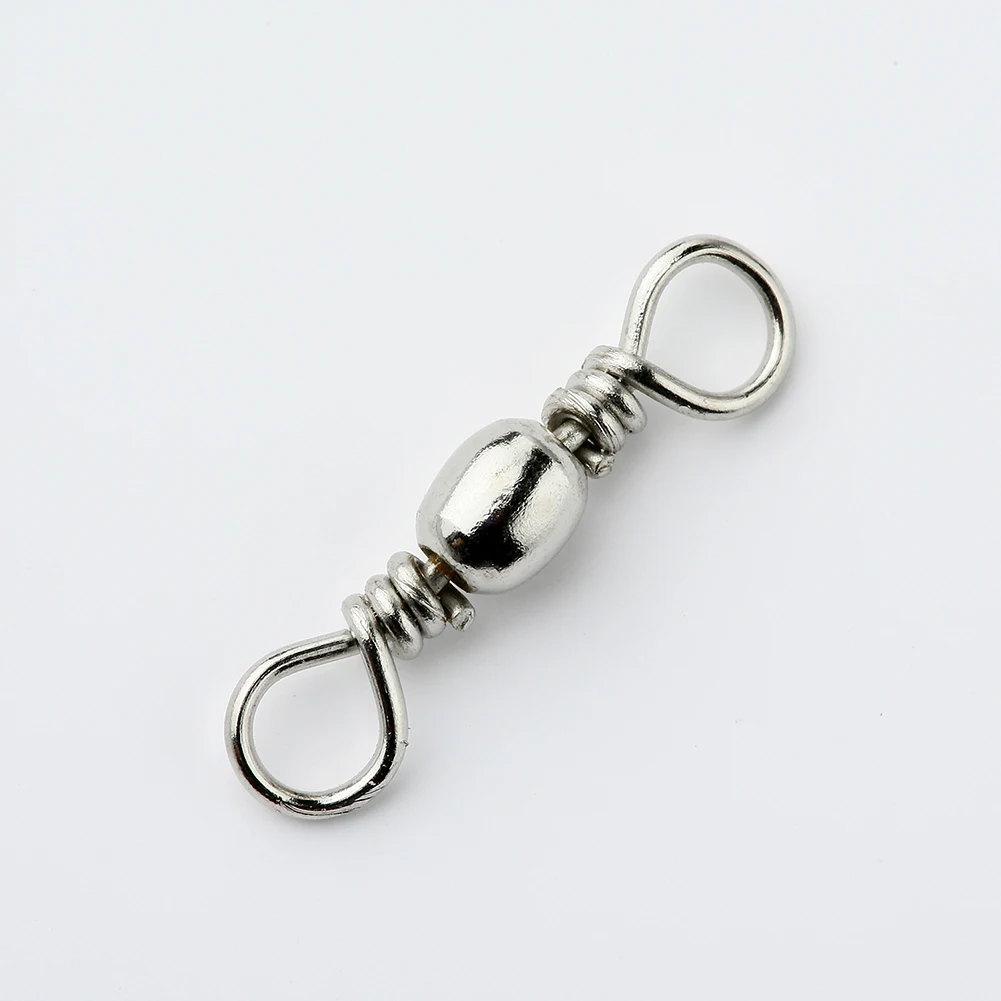 Conector de anzuelo giratorio mostrando su diseño de barril y conexión snap para señuelos de pesca