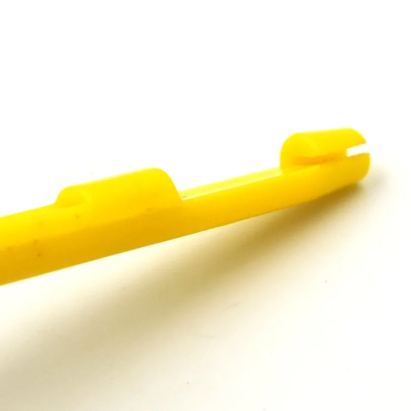 una herramienta de plástico amarillo diseñada para un uso fácil y eficiente