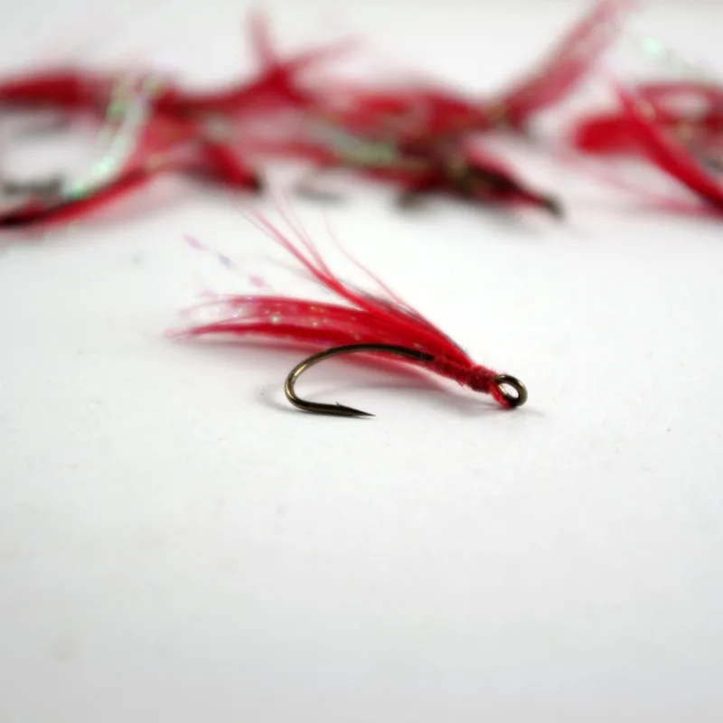 Anzuelos de pesca con pluma y ojo grande, señuelos de cuchara de tamaño pequeño, gancho único curvo, accesorios de piel, lote de 10 piezas, venta - imagen 3