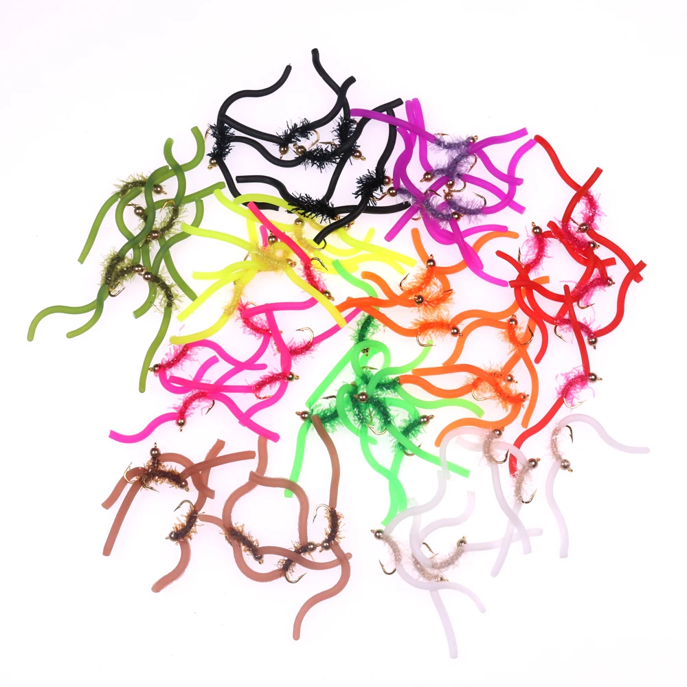 Coloridas moscas de pesca para atraer peces