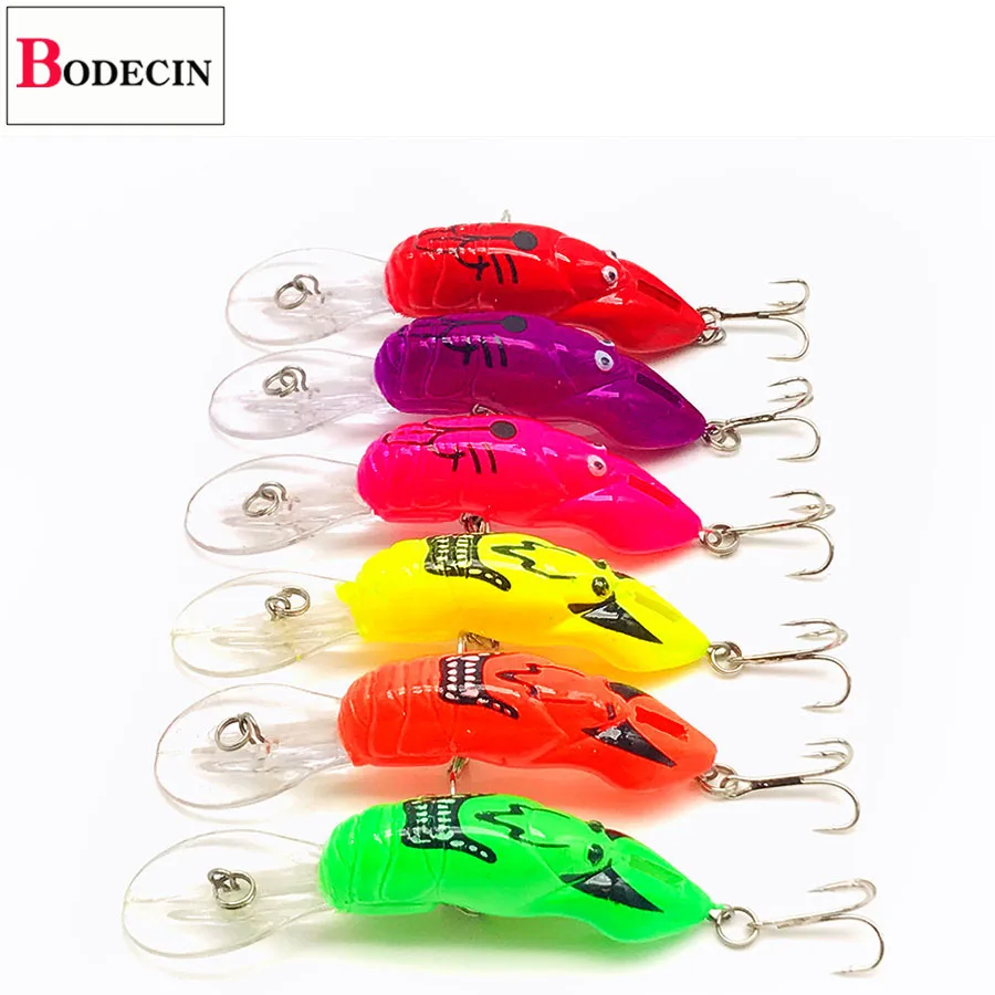 Una fila de coloridos señuelos de pesca con un logotipo de Bodecin