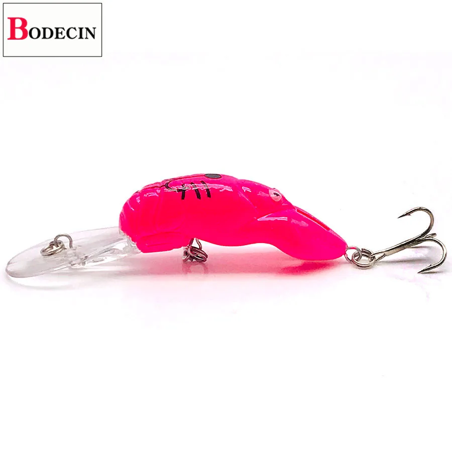 Un señuelo rosa y claro con un gancho en el extremo