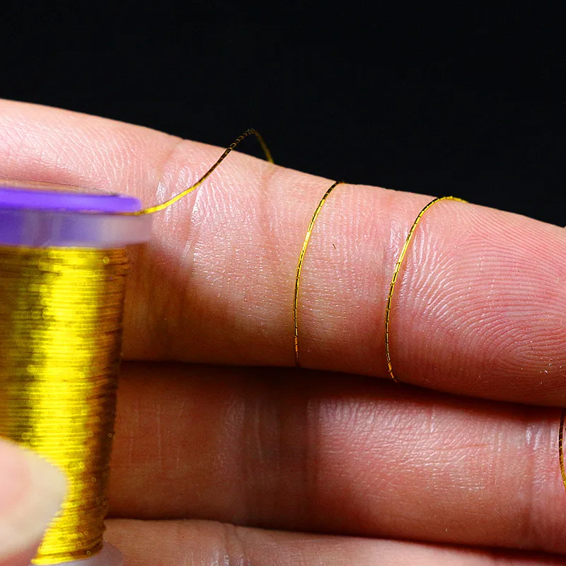 Royal Sissi, 2 carretes, estilo francés, atado de moscas, oropel ovalado, alambre de oropel metálico barnizado, materiales para el cuerpo con nervuras medianas doradas y plateadas - imagen 5