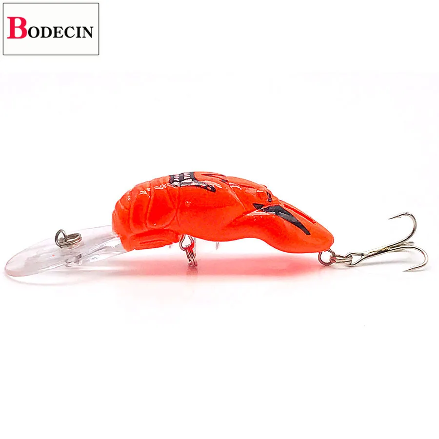 Un señuelo rojo y naranja con un gancho en el extremo