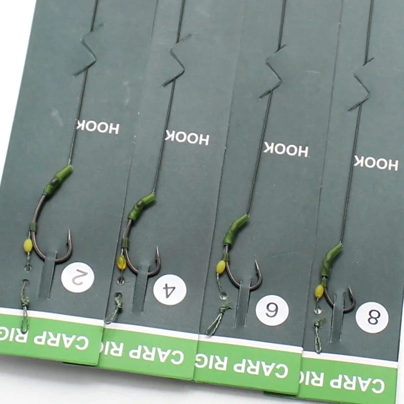 Aparejos para el cabello de pesca de carpa Rigtrip mostrando gancho listo para usar y boiles