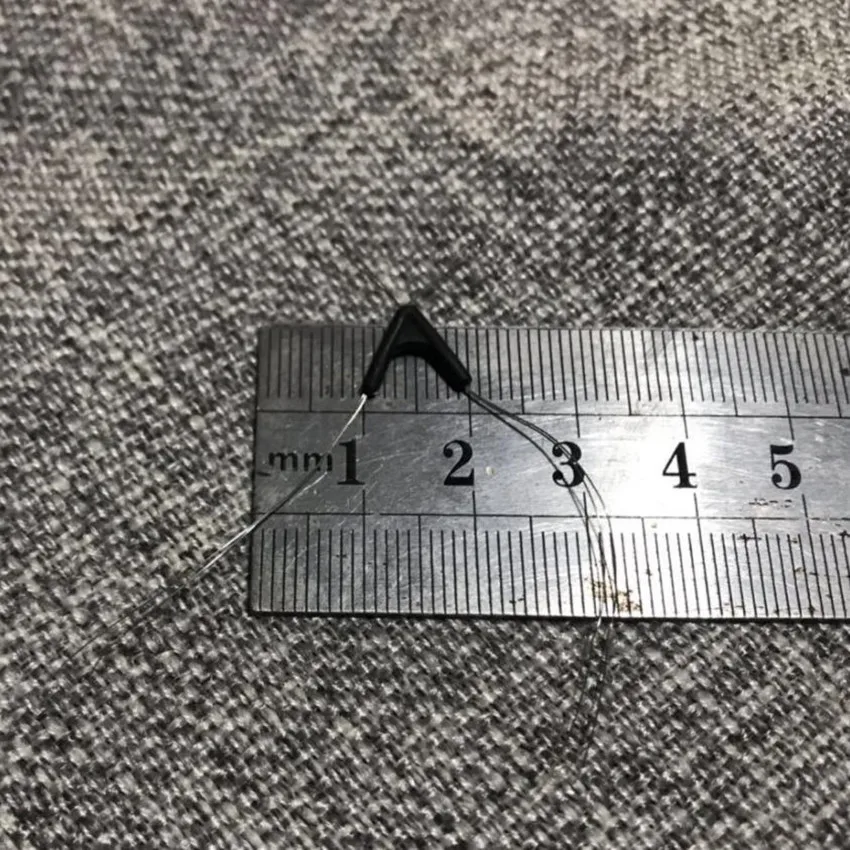 Una regla con una aguja