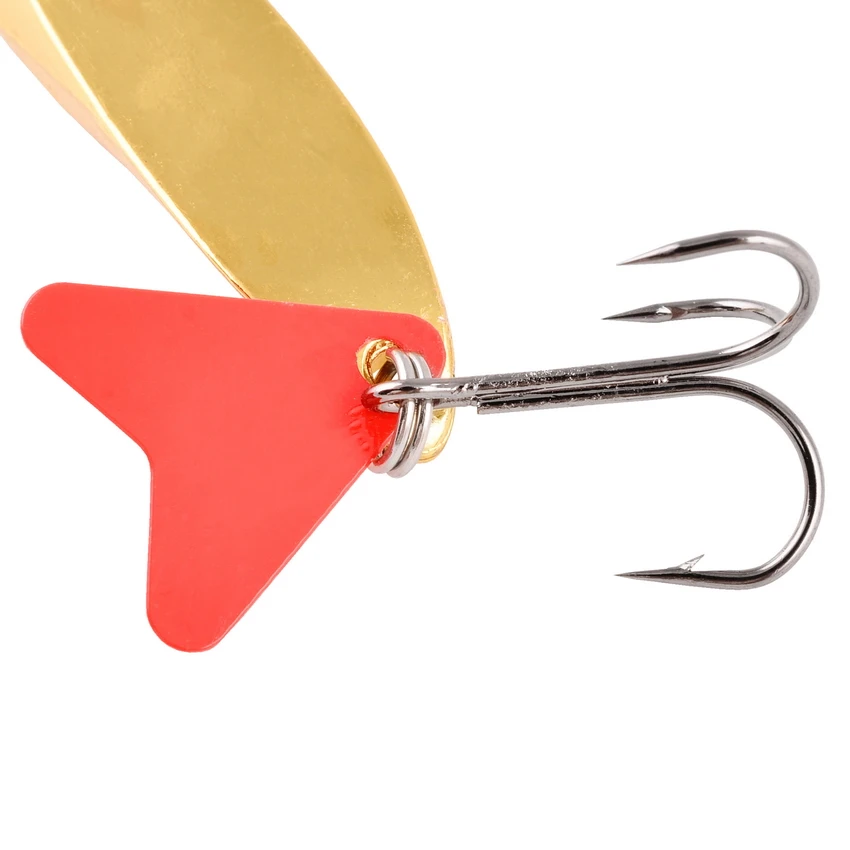 un señuelo de pesca con un diseño rojo y dorado perfecto para atraer peces