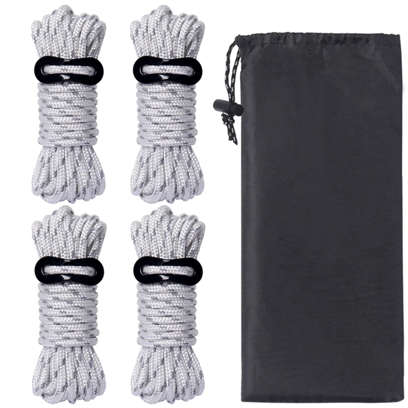 Un conjunto de cuerdas grises duraderas perfectamente enrolladas y aseguradas con clips negros, combinados con una bolsa de transporte negro para un fácil transporte