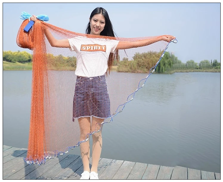 ¡Descubre la alegría de pescar con nuestra vibrante red naranja perfecta para un día junto al agua!