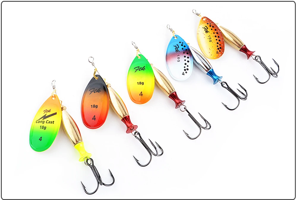 Señuelos de pesca coloridos con ganchos de agudos para capturas efectivas