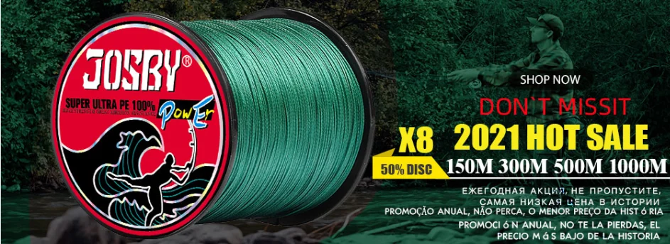 Un carrete de hilo de pescar con la marca JOSBY impresa. El carrete es verde y tiene una etiqueta roja con el nombre de la marca y algún texto adicional.