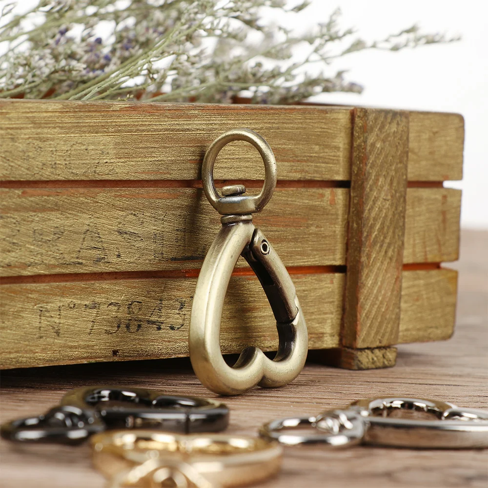 Corazón hebillas Clips de mosquetón Chapado en aleación de Zinc puerta primavera anillos ronda a desencadenar ganchos rápidos mosquetón negro/oro/plata - imagen 3