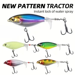 Whopper Popper Superficie: Señuelo con soft tail giratoria