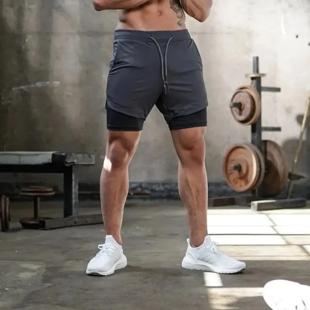 Pantalones cortos finos para correr de secado rápido, pantalones cortos de entrenamiento elásticos de doble capa, pantalones cortos de entrenamiento transpirables con bolsillo para teléfono móvil para correr - imagen 5