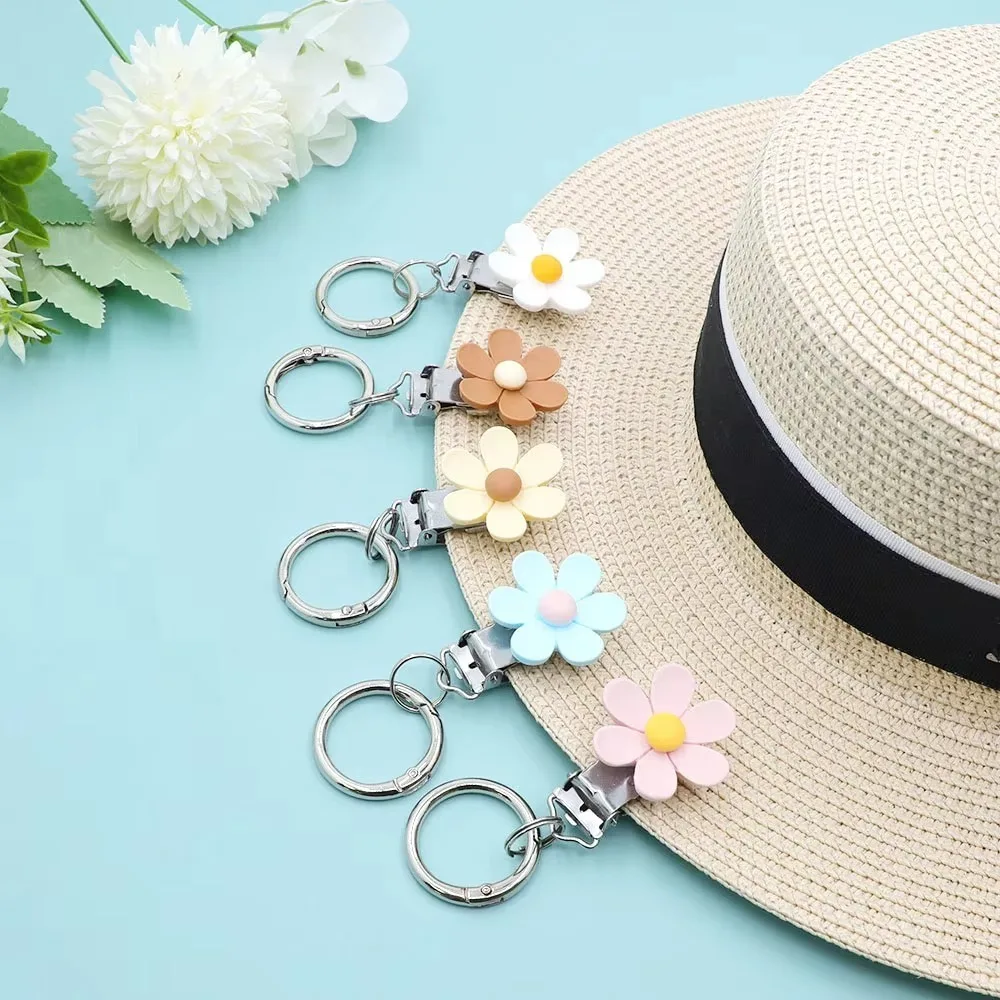 Bolsa colgante portátil con Clip para sombrero, soporte ligero con forma de flor, Clip para sombrero colgante a mano libre, viaje - imagen 3