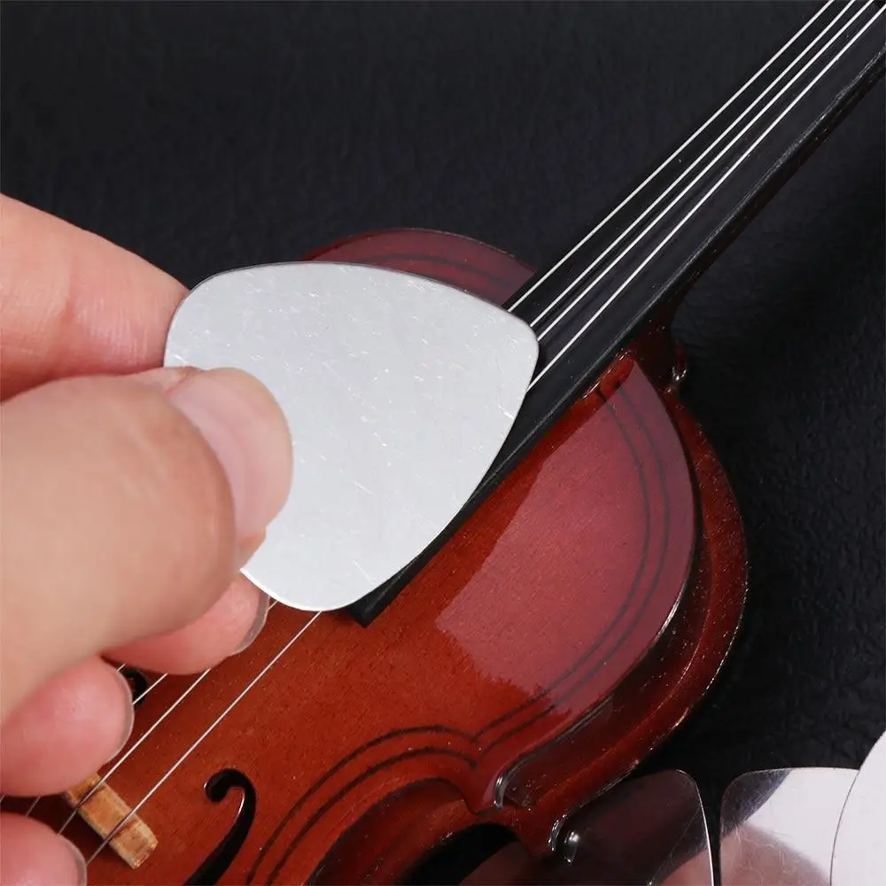 Palillos de guitarra de acero inoxidable, 10 Uds., 0,3mm, mediador, triángulo, palillo de guitarra de Metal, gestos adhesivos, metralla para dedo - imagen 5