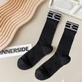 black mid-tube sock