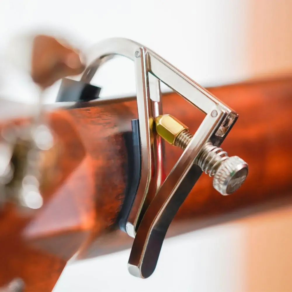 Cejilla de guitarra con diseño de extractor de pines, almohadilla de silicona con soporte para púas, Clip de afinación de guitarra, abrazadera de cambio rápido para guitarra clásica portátil - imagen 2