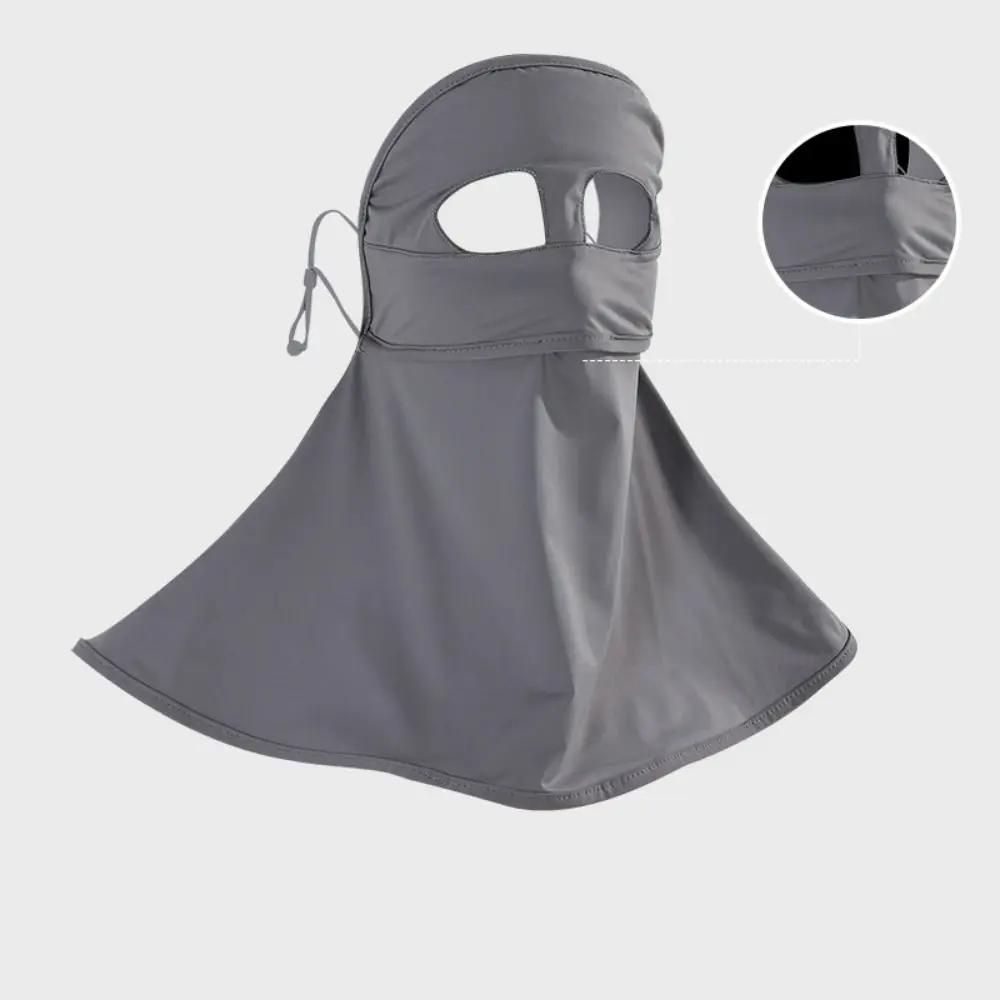 Esta elegante balaclava gris ofrece protección y estilo para actividades al aire libre.