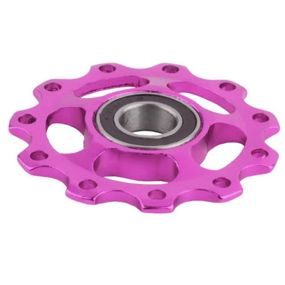 Un vibrante plato de bicicleta rosa diseñado para un alto rendimiento y durabilidad