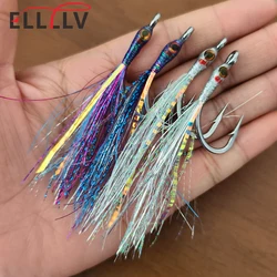Mosca de acero 4/0 con cabeza epoxi y oropel para lucio y lubina