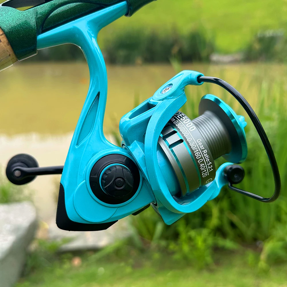 Carrete giratorio 2000-7000 arrastre máximo ultraligero 12kg 5,2: 1 carrete de pesca Surfcasting carretes de Jigging de agua salada para pesca al aire libre - imagen 3