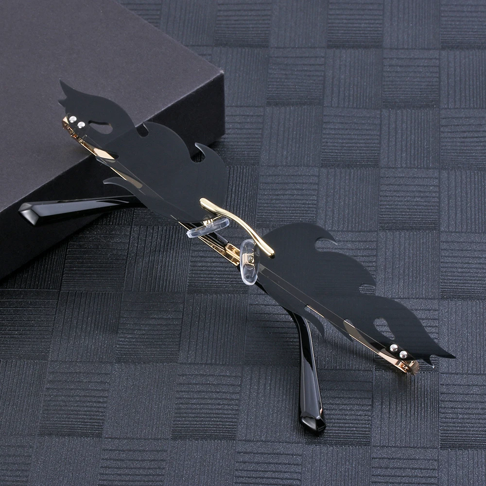 Gafas de sol sin montura para hombre y mujer, lentes de sol de moda Unisex, con llama de fuego, UV 400, onduladas, a la moda - imagen 4