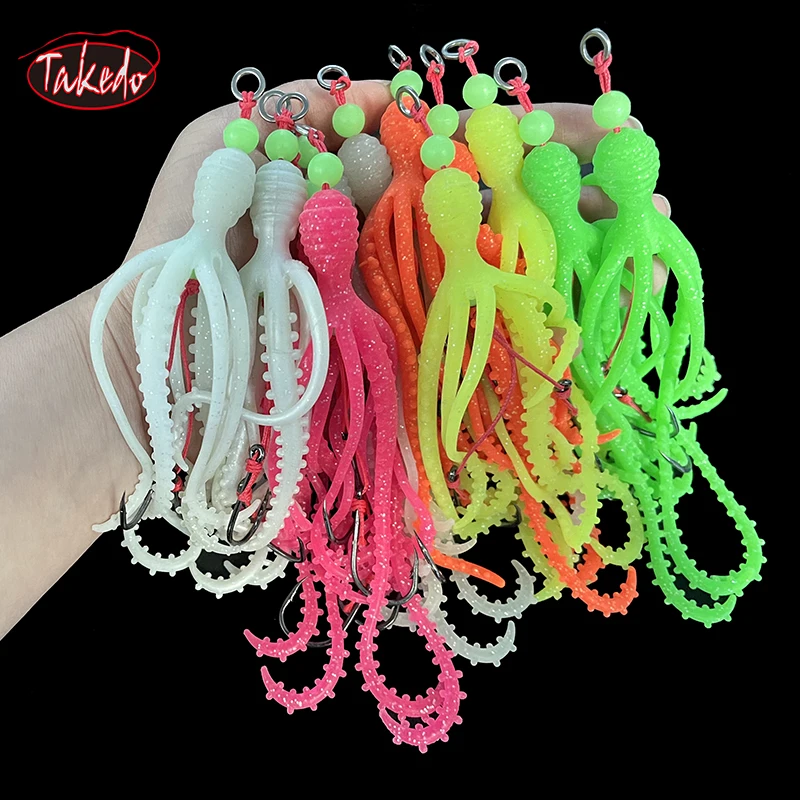 TAKEDO 2 unids/bolsa 9G TPR falda de pulpo calamar luminoso suave señuelo pesca en el mar UV señuelo de curricán cebo Artificial para lubina atún - imagen 5