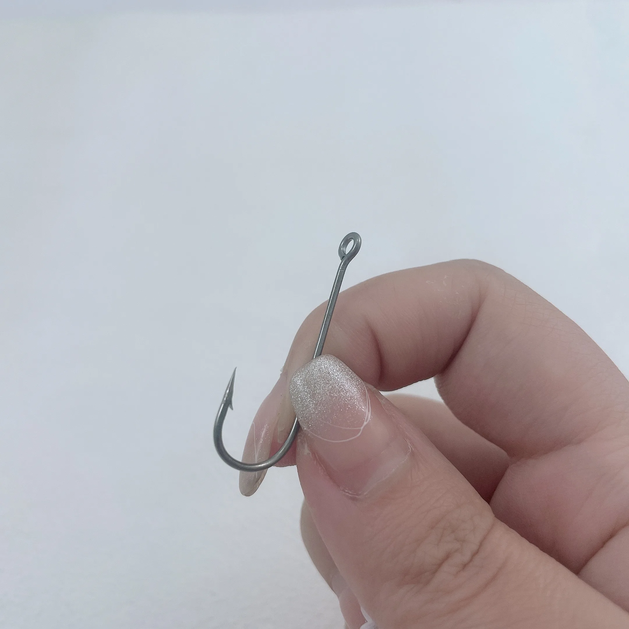 2 paquetes 002BN anzuelo de pesca de agua salada Color blanco anzuelos individuales Jig Head juego de anzuelos caja de aparejos de pesca de alta resistencia - imagen 3