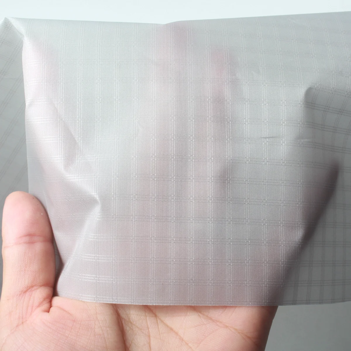 1m D3 61gsm 50D 0,7 cm tela impermeable de poliéster Ripstop de triple línea para velero