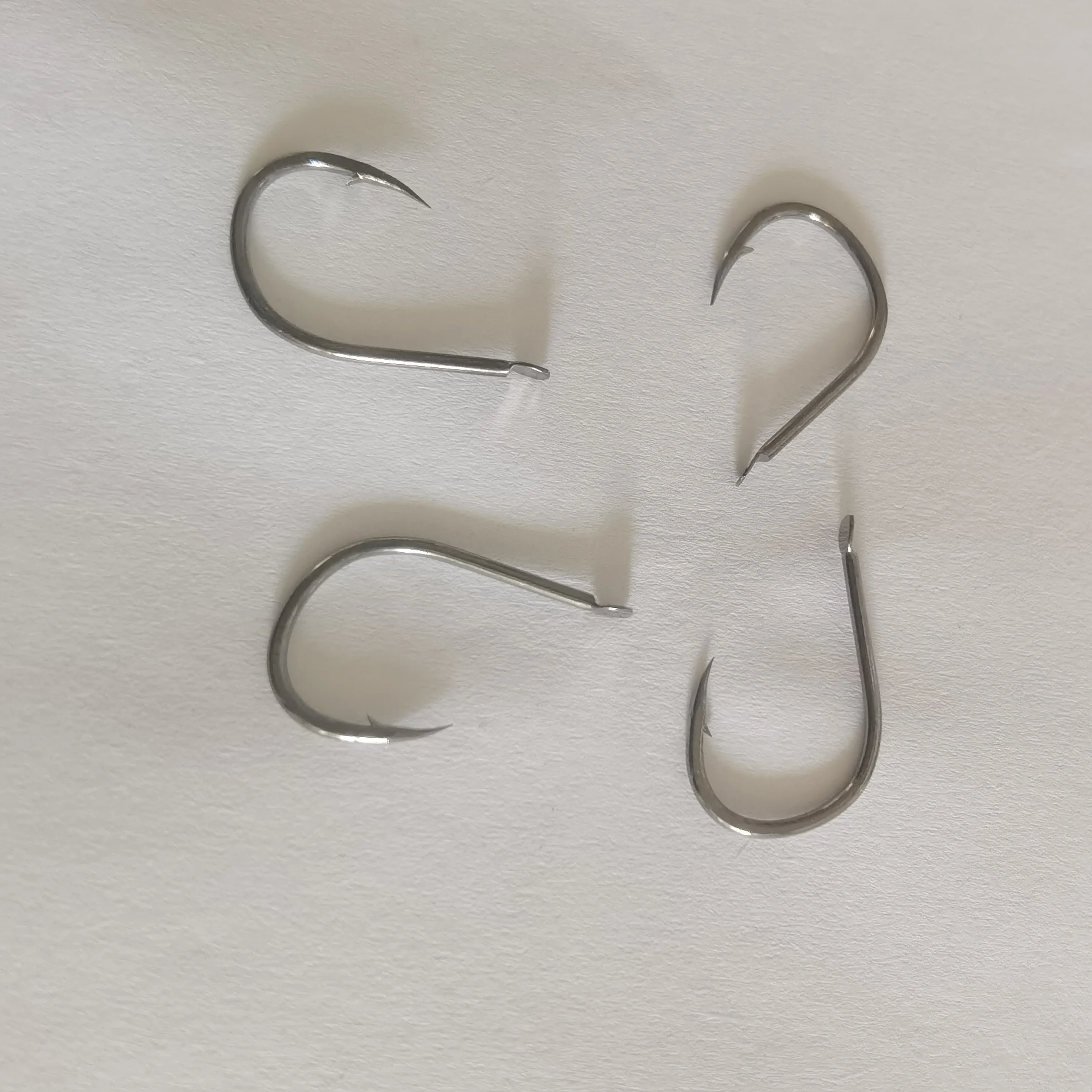 Anzuelos de Pesca de cabeza plana sin ojos, anzuelos de púas para carpa, accesorios de Material de Pesca, 200 Uds. - imagen 4