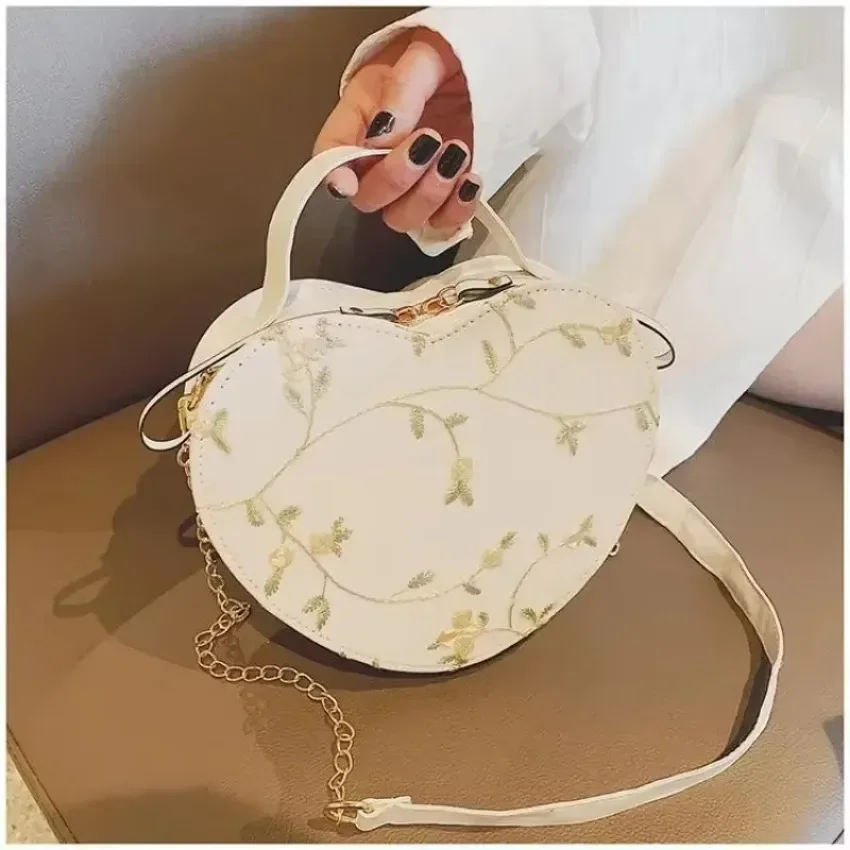 Bolsos redondos de corazón de encaje para mujer, bandolera de cuero de PU, bolso cruzado en forma de corazón para primavera y verano