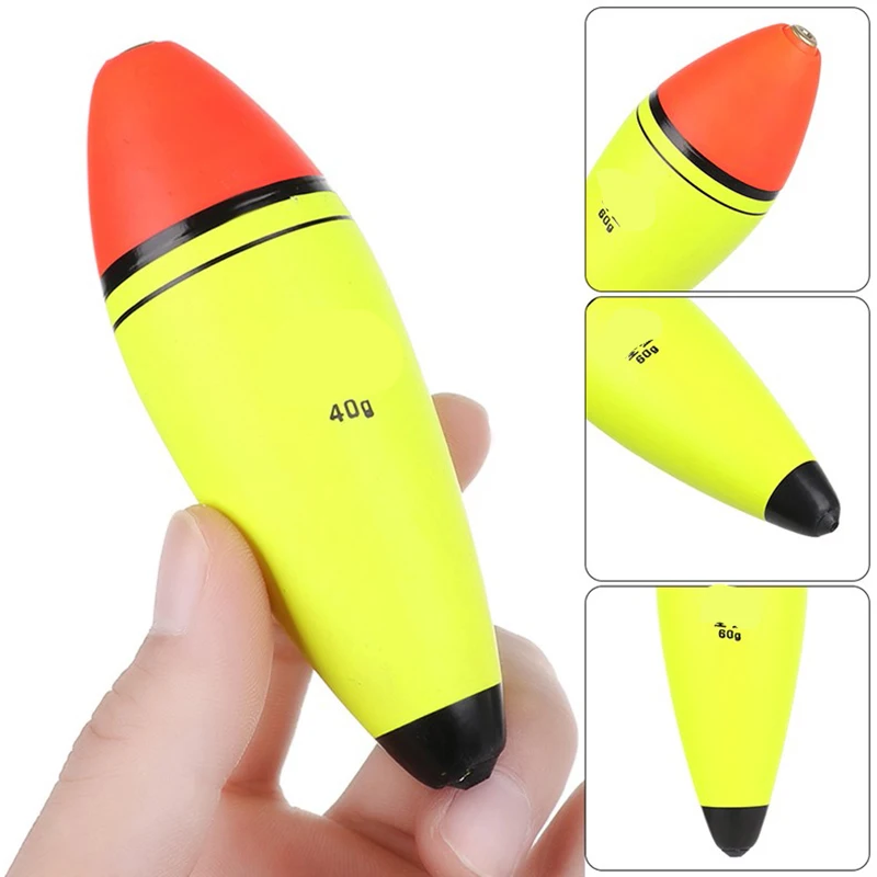 Un objeto amarillo y negro está sosteniendo una mano