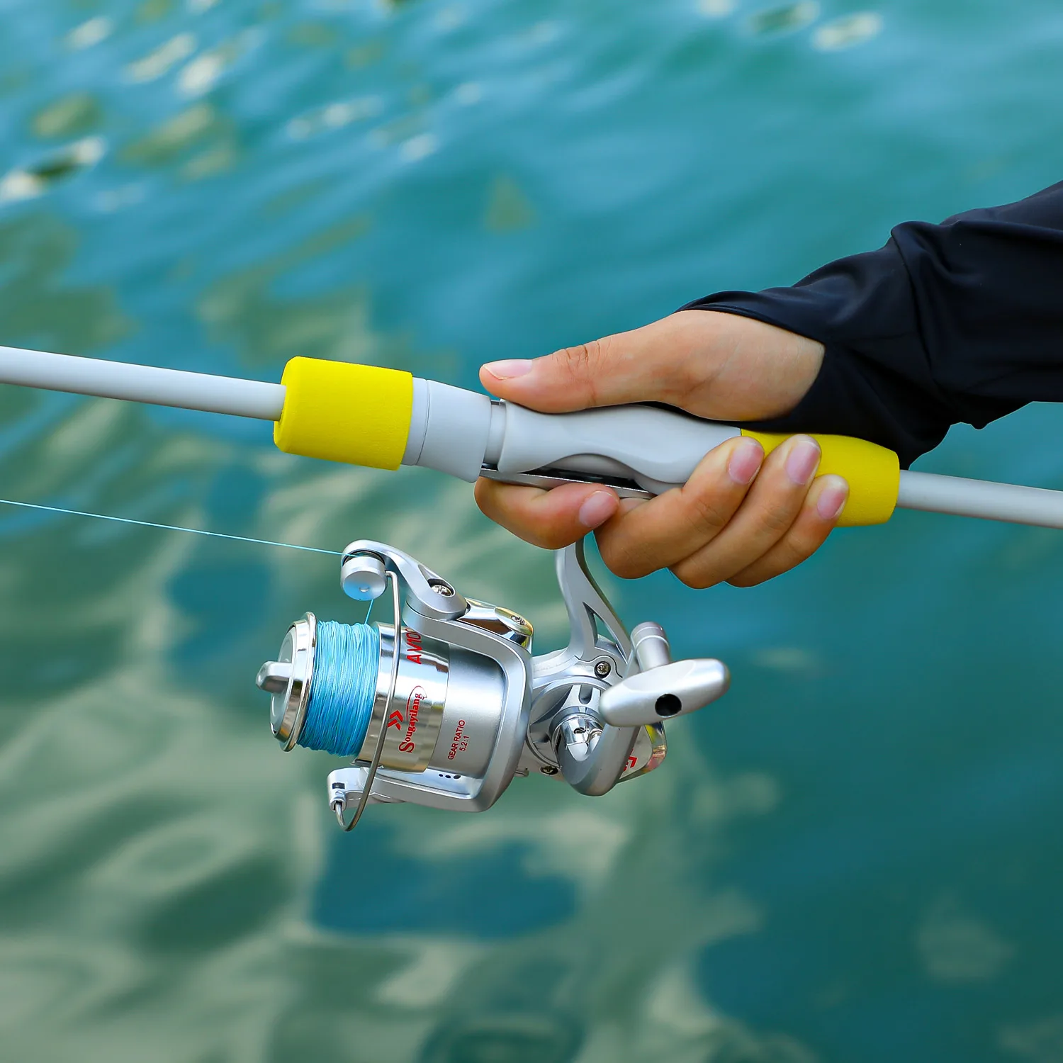 Sougayilang, caña de pescar giratoria de 2 secciones y carrete de pesca Combo 1,8/2,1 m, caña de pescar de fibra de carbono 5,2: 1, carrete de pesca para lubina - imagen 5