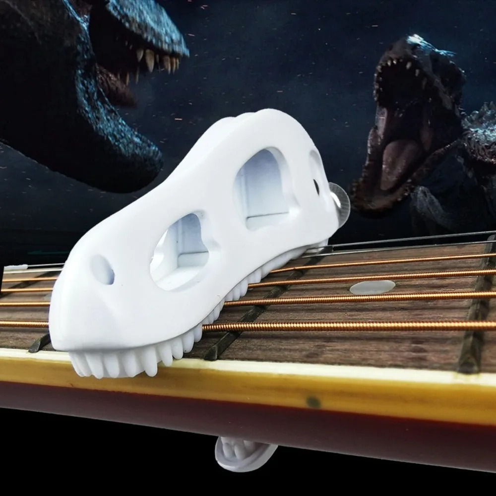 Cejilla antideslizante para guitarra con calavera de dragón, con dientes de silicona, forma de cabeza de tiranosaurio, abrazadera de aleación de Zinc ajustable Universal - imagen 3
