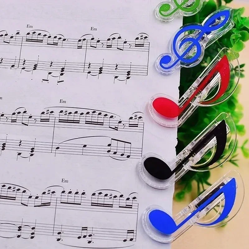 Clips decorativos de acero con diseño de notas musicales para oficina