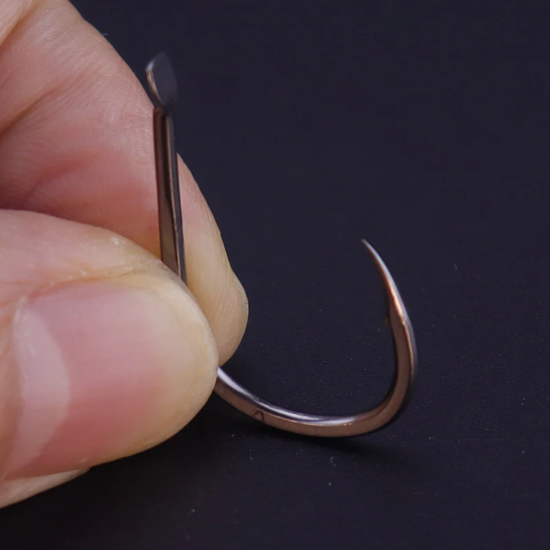 50 unids/lote de anzuelos de pesca con revestimiento de acero inoxidable de alto carbono, anzuelos de carpa de Color negro con púas, anzuelo aplanado afilado - imagen 3